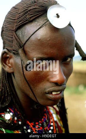 Maasai semi-nomadic people located in Masai Mara National Reserve Kenya Africa. Stock Photo