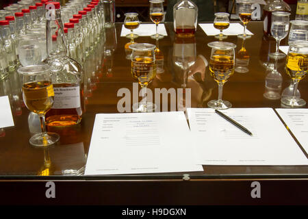 Loretto, KY, USA - October 21, 2016 :  Glasses and bottles on table of Maker's Mark in sensory and testing lab of distillery. Stock Photo