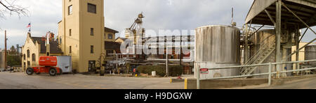 Lawrenceburg, KY, USA - October 19, 2016 :  Workers outside Four Roses Bourbon Distillery and factory on Kentucky Bourbon Trail. Stock Photo