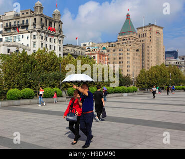 China, Shanghai, The Bund, North China Daily News building, Peace Hotel, Bank of China, historic architecture, Stock Photo
