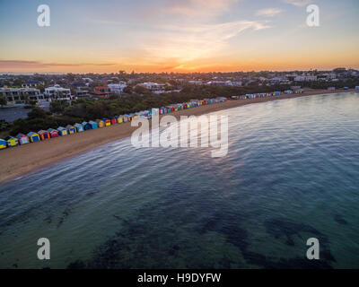 Aerial view of sunrise at Brighton Beach showing the suburb and bathing boxes. Melbourne, Victoria, Australia Stock Photo
