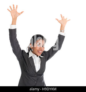 Portrait of black business woman in formalwear arms raised and smiling, isolated on white background. Stock Photo