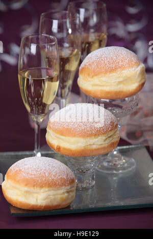 Doughnut and sparkling wine, carnival season Stock Photo