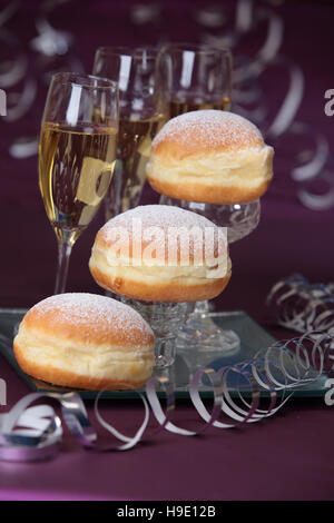 Doughnut and sparkling wine, carnival season Stock Photo