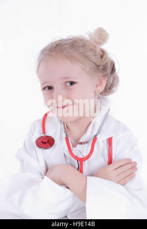 Seven-year-old girl dressed up as a doctor Stock Photo