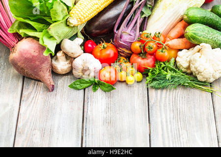 Vegetables on wooden table Stock Photo