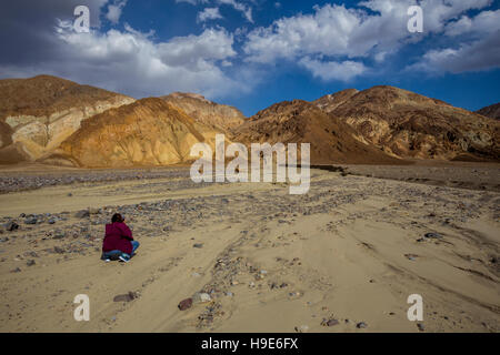 Female photographer, desert landscape, along, Badwater Road, Death Valley National Park, Death Valley, California Stock Photo