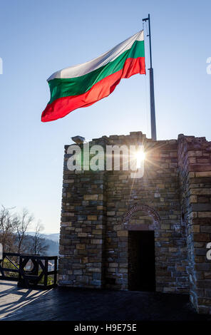 Bulgarian flag waving over the ruins of Tzarevetz fortress in Veliko Tarnovo, Bulgaria Stock Photo
