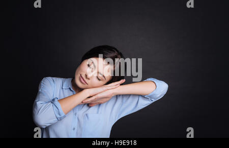 Pleasamt tired woman sleeping Stock Photo