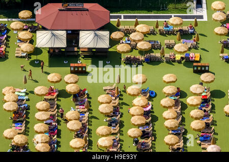 Aerial, Swimming pool with sun terrace and sunshades, camping guests, sunbathing, holiday, camping Clodia, Garda Lake, Lago Stock Photo
