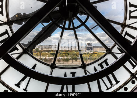 view through the giant clock of the Musee d'Orsay in Paris, France Stock Photo