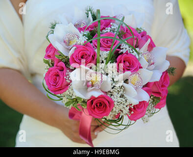 wedding bouquet with pink roses and  orchids Stock Photo
