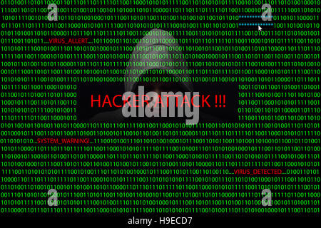 Hacker over a screen with binary code and warning messages Stock Photo