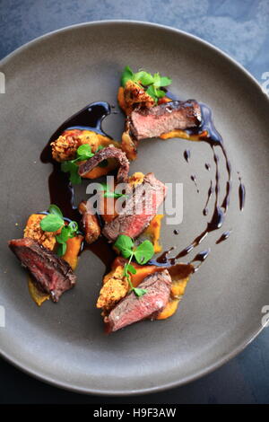 Txogitxu steak with batat cream, fried chickpeas and demiglace Stock Photo