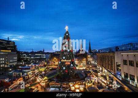 Dortmund / Germany, Nov. 22th. 2016 - The world's largest Christmas tree - Made of 1700 red spruce and with a height of 45 meters, the Dortmund Christmas tree on the Christmas market is the world largest of its kind. An illuminated trumpet angel on top, lightend with 48.000 LED lamps and decorated with big red and gold colored balls, attracts the tree visitors from all over the world in its 20th year. - © Friedrich Stark / Alamy Live News Stock Photo