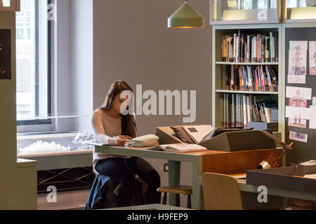 A female student studying in the Wellcome Library, London. Stock Photo