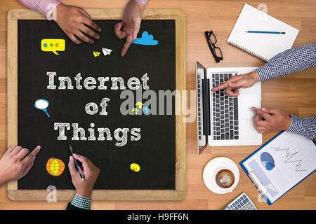 business man hand working and internet of things (IoT) word diag Stock Photo