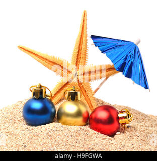 Christmas decoration on sand isolated on white Stock Photo