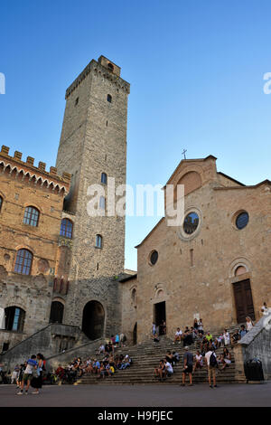 Torre Grossa, tower of the Palazzo del Popolo (old townhall) and cathedral, Piazza del Duomo, San Gimignano, Tuscany, Italy Stock Photo