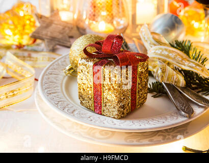 Christmas setting with festive present and decorations Stock Photo