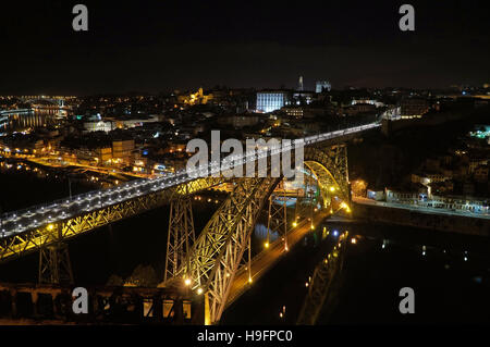Dom Luis bridge over Douro river at night in Porto Portugal Stock Photo