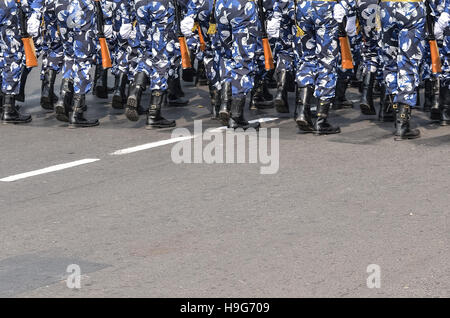 Calcutta, India - January 24, 2016: A team of military are walking with assault rifle. Indian Army are practicing parade for rep Stock Photo