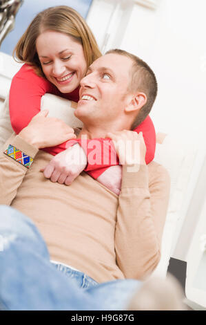 Happy young couple at home Stock Photo