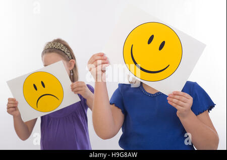 Sad and happy child, symbolic picture Stock Photo