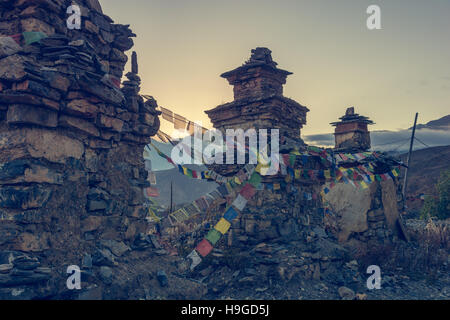 Buddhist stupas connected with praying flags. Stock Photo