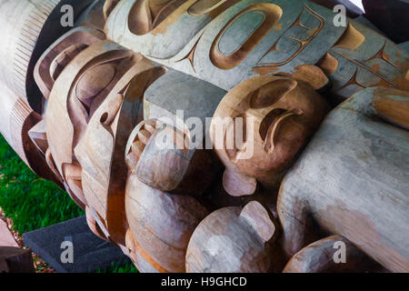 Detail of a totem pole being carved from an 800 year old Western Red Cedar tree Stock Photo