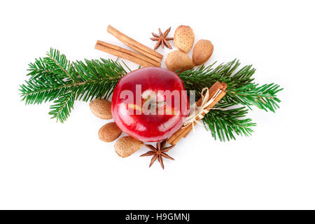 Red Apple with Christmas spices on white background. Flat lay, top view. Stock Photo