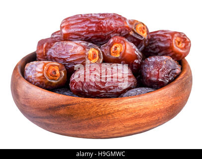 Dried dates. Bowl with dry dates isolated on white Stock Photo