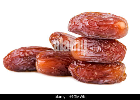 sweet dried dates pile stack on white Stock Photo