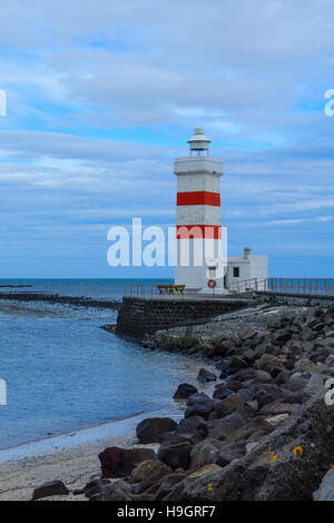 The old lighthouse (built 1897) in Gardur, the Southern Peninsula region in southwest Iceland Stock Photo