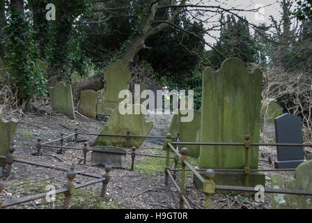 A creepy, spooky old Victorian graveyard with blank headstones Stock Photo