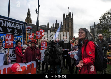 London, UK. 23rd November 2016. Axe the Housing Act protest as Philip Hammond, Chancellor of the Exchequer delivers his Autumn Statement to Parliament, London, UK  Credit:  claire doherty/Alamy Live News Stock Photo