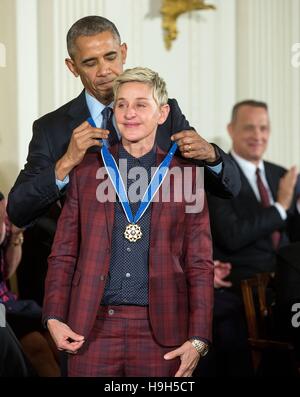 Washington, United States Of America. 22nd Nov, 2016. President Barack Obama presents the Presidential Medal of Freedom to Ellen DeGeneres during a ceremony in the East Room of the White House November 22, 2016 in Washington, DC. Credit:  Planetpix/Alamy Live News Stock Photo