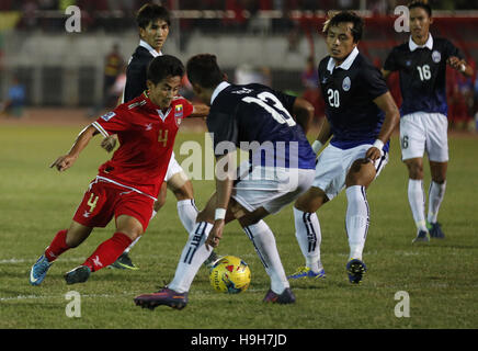 Yangon. 23rd Nov, 2016. David Htan (1st L) of Myanmar breaks through during the AFF Suzuki Cup Group B soccer match between Cambodia and Myanmar at Thuwanna Stadium in Yangon, Myanmar on Nov. 23, 2016. Myanmar won 3-1. © U Aung/Xinhua/Alamy Live News Stock Photo