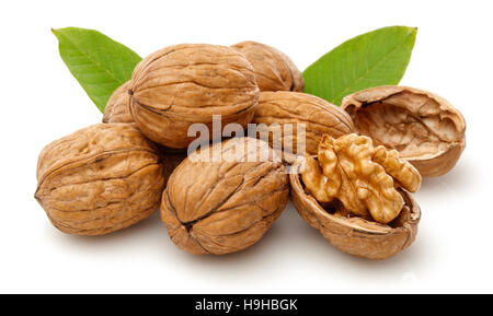 Half walnut kernel and whole walnut. Isolated on a white background Stock Photo