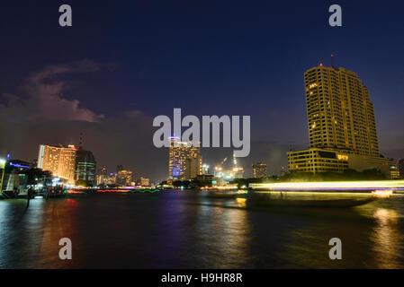 Blue hour on the Chao Phraya River, Bangkok, Thailand Stock Photo