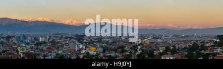 Panoramic view of Kathmandu city and the Himalayas from Patan, Nepal Stock Photo