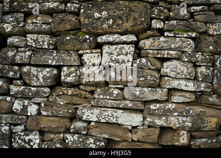 old gray stone wall texture background close up Stock Photo