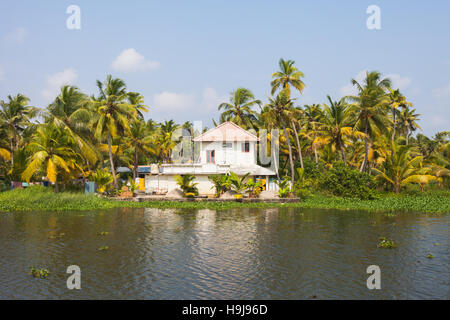 Scenic photograph of the waterways or backwaters with house near Alleppey, Kerala, India Stock Photo