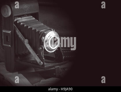 Vintage camera Isolated on black background Camera vintage 50s Stock Photo