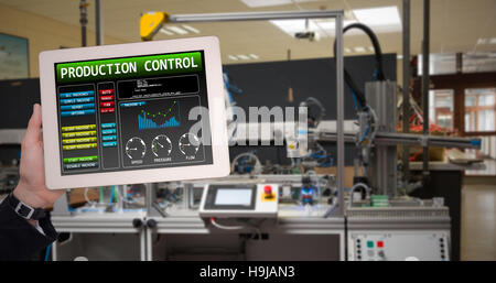 Composite image of masculine hand holding tablet Stock Photo