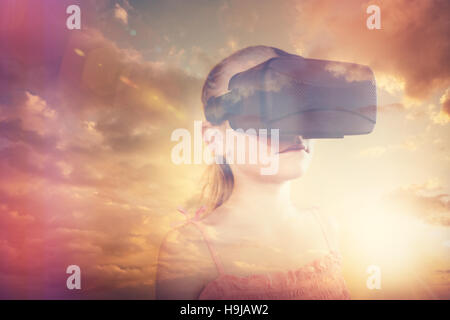 Girl using a virtual reality device Stock Photo