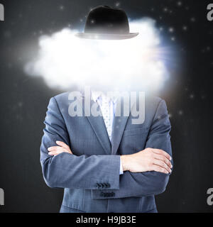 Composite image of midsection of businessman standing arms crossed Stock Photo