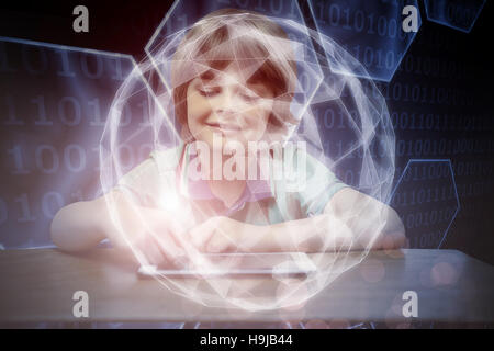 Composite image of pupil using tablet pc Stock Photo