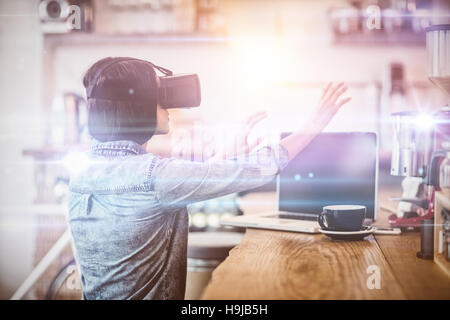 Young woman using the virtual reality headset Stock Photo