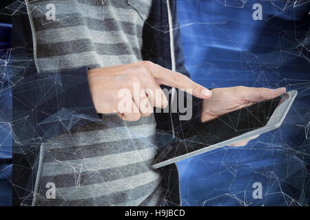 Composite image of cropped image of man using tablet Stock Photo